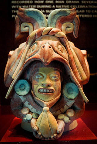 A carved Maya figure
