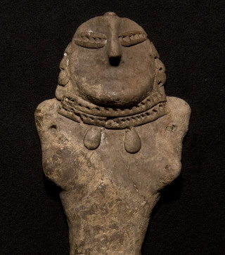 A carved stone figure. 