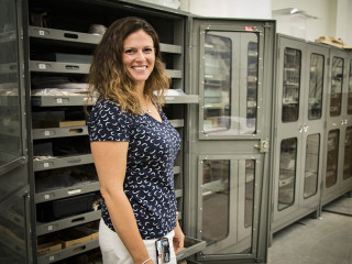 Lisbeth standing in the Museum&#039;s collections.