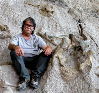 Dr. Dan Chure in a fossil quarry.