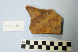 A red-on-orange pottery sherd that tested positive for cacao residue.