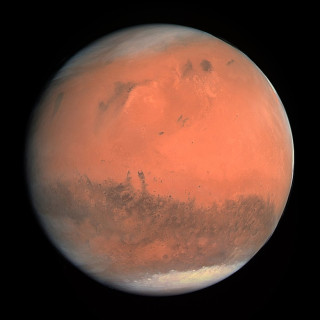A view of Mars showing the ice cap to the south.