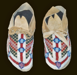 A pair of beaded moccasins.