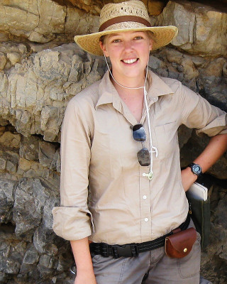 A portrait of a paleontologist in the field. 