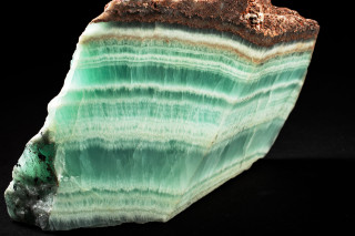 A spectacular polished specimen of the banded blue-green fluorite.