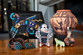 A gift guide featuring pottery and paintings from indigenous artists.