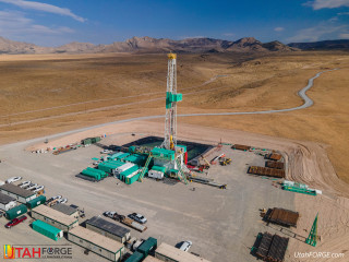 A drill site in the desert photographed from above.