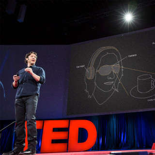 David Eagleman speaks on the TED Talks stage. 