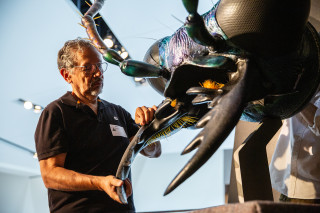 Fernando sr. installs a mandible on the large model of the tiger beetle head. 