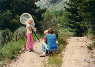 Family hike catching butterflies