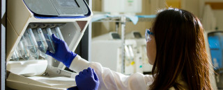 A scientist working in a lab.