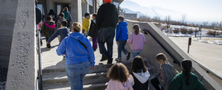 Students walk into NHMU