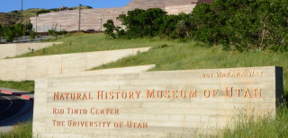 A sign outside the Natural History Museum of Utah showing the museum&#039;s name