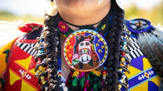 A close up of a Native American piece of jewelry.