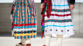 Navajo dancers in traditional skirts. 