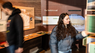 Guests explore the Climate of Hope exhibit 