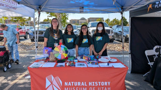 Critical Action Lab fellows hosting a table at a local climate event