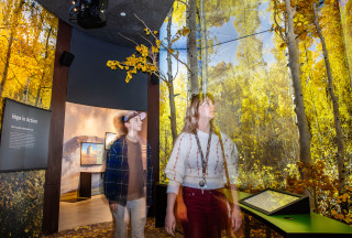 Guests explore the Climate of Hope exhibit 