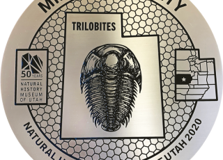Millard County Marker featuring a trilobite. 