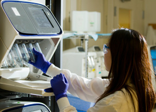 A scientist working in a lab.